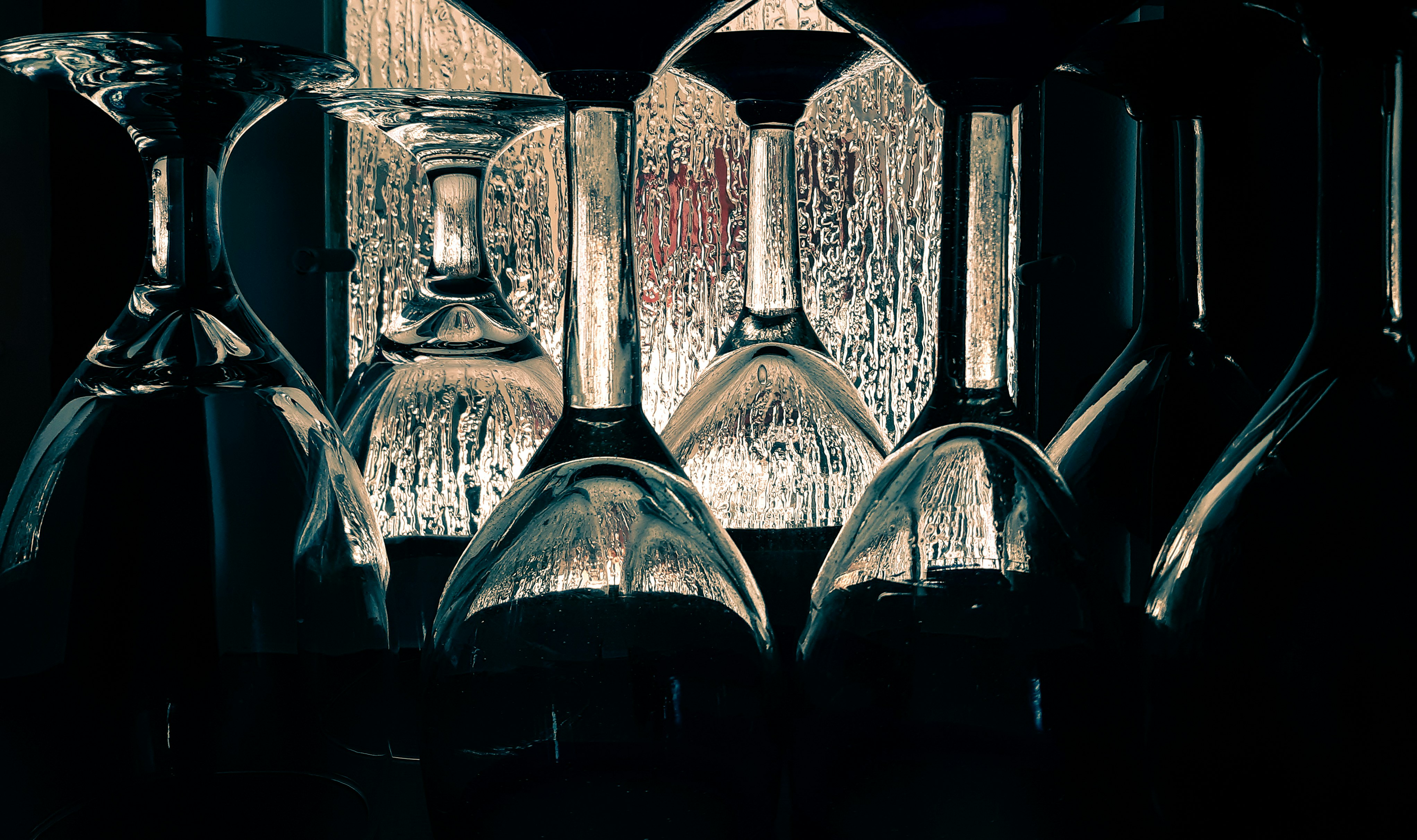 black glass bottles in black background